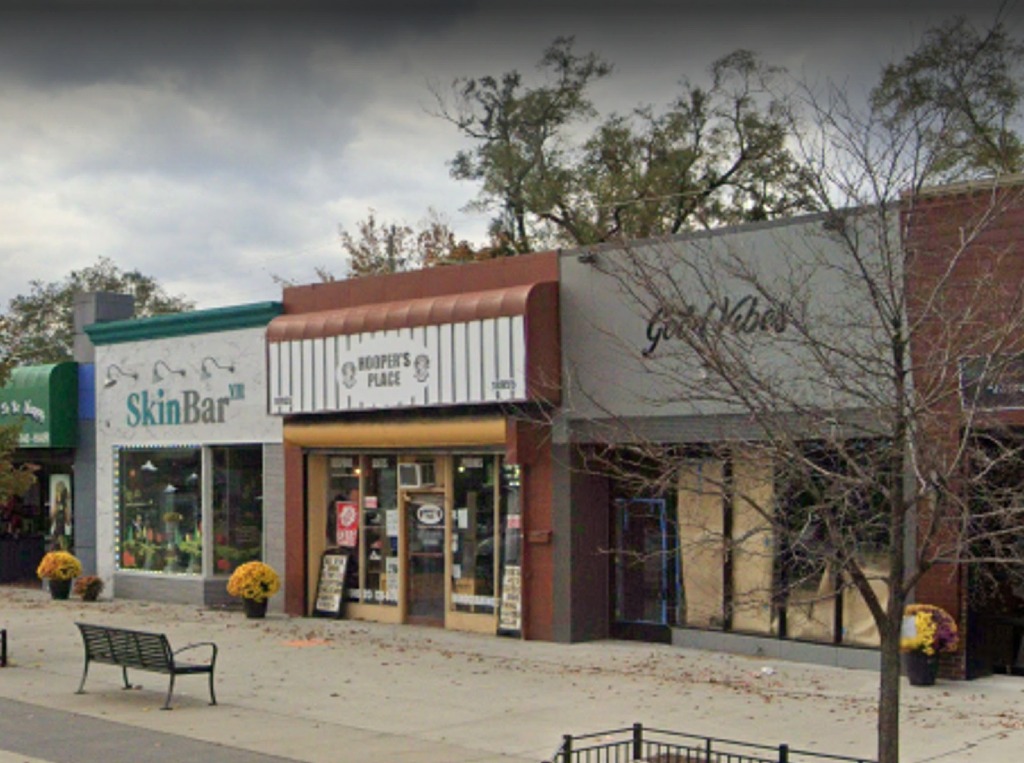 View of small businesses on Livernois in Detroit, including SkinbarVII.